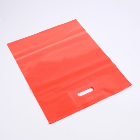 Polyethylene package with a cut handle, red 30-40 cm, 50 μm-1