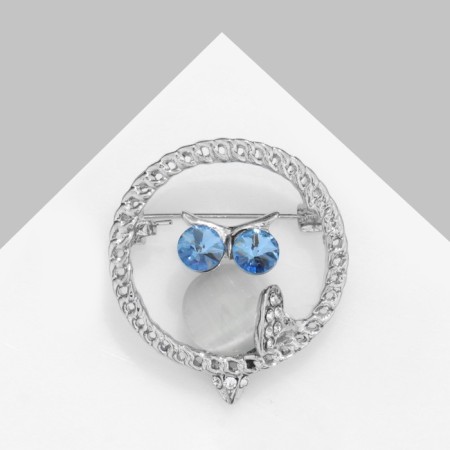 Owl's “cat eye” brooch, white-blue color in silver