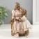 Polystone souvenir "Cozy evening with grandmother behind the book" 12.5x10.5x15.5 cm