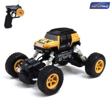 The radio -controlled “Army” jeep works on the battery, the color of the sand
