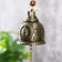 Metal bell "Buddha and carp" h = 4.8 cm d = 6 cm