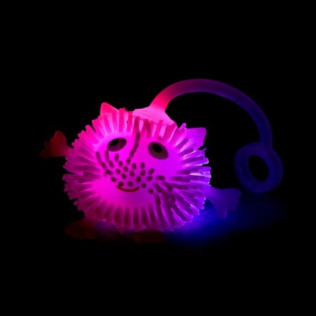 The ball is a children's rubber hedgehog "Conduct with legs and handles", light, color mix-4