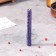 A candle from wax with a rose "Energy, Harmony and Bliss", 13x1.7 cm, 1 h, purple