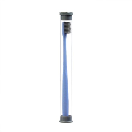 The toothbrush is soft, in the tube, blue