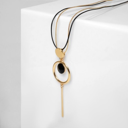 Pendant "chain" totem, a ring with a needle, the color is black in gold, 70cm