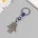 Keychain from the evil eye metal "Fatima openwork" 4.2x5.5 cm