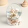 Souvenir Polystone Water Ball "Losik with a gift" White with gold 7x8x9 cm