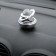 The accessory on the panel, gravitational rings, rotates from the sun, silver