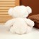 Soft toy "Bear", with a bow, 22 cm, white color
