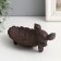 Souvenir cast iron stand "Bird on the sheet" 18x9x8 cm