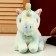 Soft toy "Unicorn" 23 cm, green color