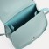 Baby bag on a magnet, the color is light turquoise