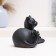 The figure "cats lie" black, 18x10x12cm