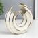 Souvenir Ceramics "Abstraction. Whirlpool" White with gold 16x16 cm