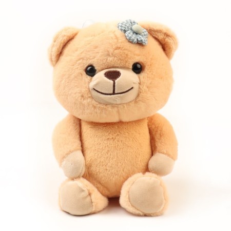 Soft toy "Bear with a flower", color mix