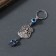 Keychain from the evil eye "Buddha in meditation" 3x7.5 cm