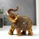 Polystone souvenir "Elephant with a golden blanket with patterns and rhinestones" 15x14x7 cm