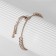 Bracelet with rhinestones "shine" on a puff, the color is white in gold