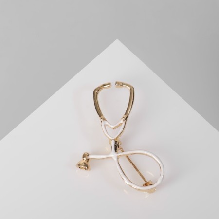 Brooch "Stetoscope", white color in gold