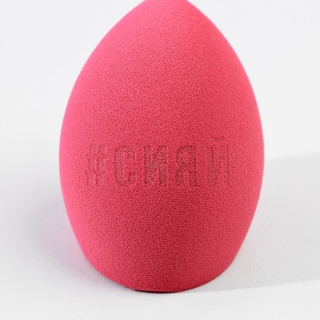Doll Face sponge on a plastic stand for drying and storage-1