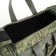 Road bag on a zipper, with an increase, 4 outer pockets, a long belt, camouflage color