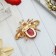 Brooch "Fly" in flight, color in gold