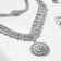Set 4 objects: earrings, necklaces, bracelet, ring "grace" circles, white color in silver