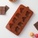 The form for decorations of the share "insects", silicone, 22 × 11.5 × 2 cm, 8 cells, brown color