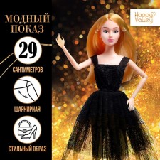 The model of the articular “Ksenia - Fashion show” in a black dress