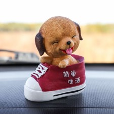 Dog on a car panel shocking his head, cute dog