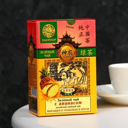 Green large -leaf tea Shennun with pineapple, cardboard. UP., 100 g
