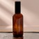 Glass bottle for perfume, with a spray, 100 ml, brown/black color