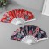 Fan plastic, textile "feathers and flowers" mix 23 cm