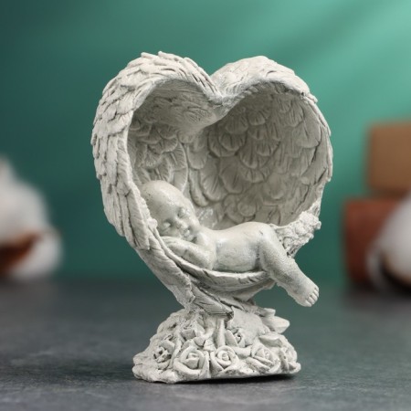 Figure "Baby sleeps in the wings" ivory, 8x5x5cm-1