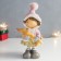 Souvenir Polystone "Girl in a pink jacket with a dog in her hands" 9.5x8.5x19.5 cm