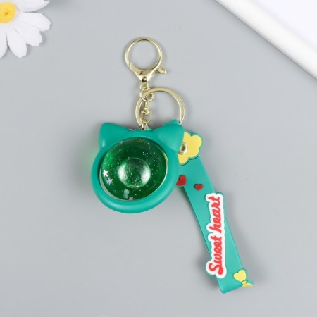 Trick Rubber "Ball-Coting" with bracelet and carbine, green 4x5x5x5.5 cm