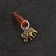 Talisman's keychain "Elephant", brass, amber