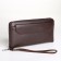 Male purse-clate on a zipper, brown color