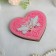 The stand for the rings "pigeons", pink, on the magnet