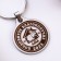 Keychain "Fertile well -being 2023", honey. steel