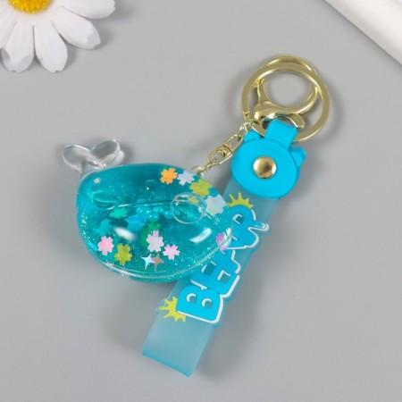 A plastic keychain with a carbine, a whale strap of water with sparkles 4x7x2.5 cm-2