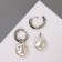 Earrings with the removable element "Transformer" pearl disk, white color in silver