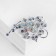 Brooch "dew" on a branch, blue color in silver