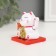 Plastic Plastic "White Mani-Neko with a fan and coin" 5x5x5 cm