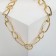The necklace "chain" is different links, color gold, 55 cm
