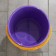 A bucket with a measured scale, 10 l, color mix