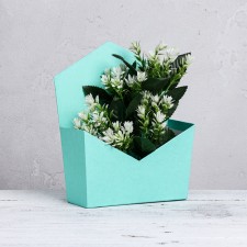 Trapection envelope is monophonic, turquoise 19.5 x 23 x 8 cm
