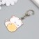 Acryl keychain "Kitten with a cracker" 4x3.4 cm