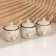 A set of ceramic cans for spices on a metal stand “Flowers”, 200 ml, 3 pcs, white color