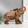 Polystone souvenir "African elephant with a baby" under a tree 20x25x10.5 cm